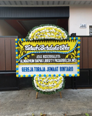 Papan Bunga Duka di Dokiri